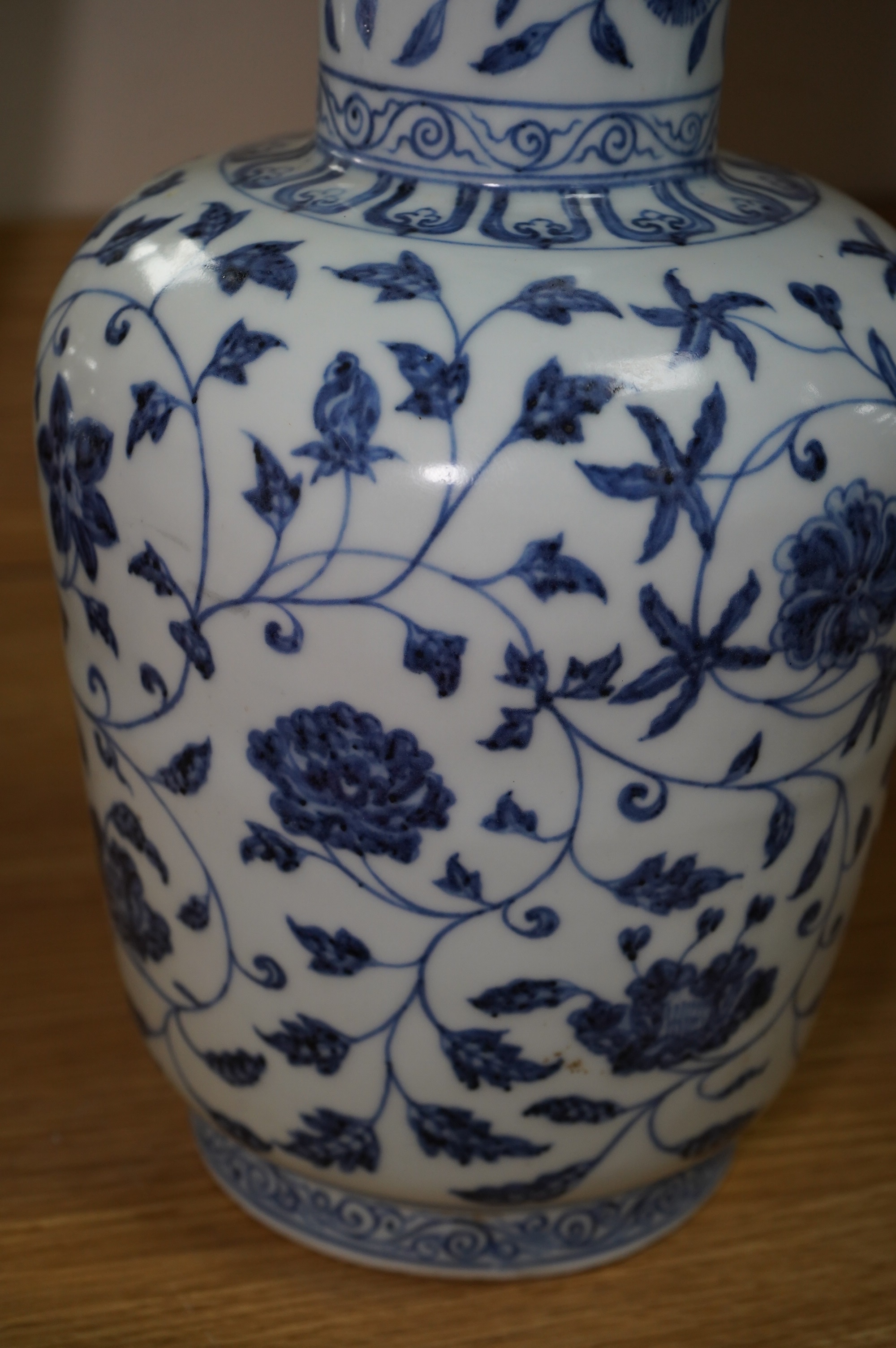 A large Chinese blue and white porcelain ewer, 36cm high. Condition - good